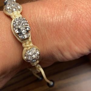 Awesome metal and crystal skull in macrame adjustable bracelet